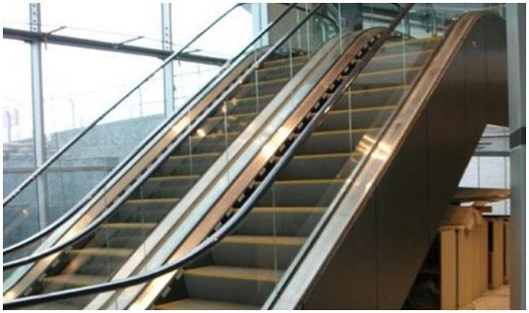 Yürüyen merdivenleri temizleyen sistem