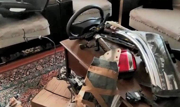 İzmir'de ilginç olay: Çalıntı aracın parçalarını salonda saklamış