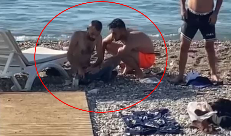 Dünyaca ünlü sahilde oynadığı tabanca ateş alan maganda herkesi korkuttu