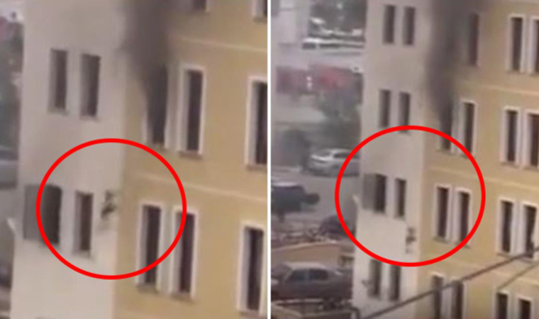 Annenin yangından kurtarmak istediği kızını 4. kattan yere açılan battaniye attığı anlar kamerada
