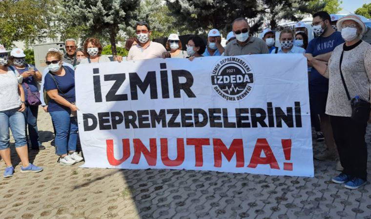 Depremzedelerden kefenli eylem