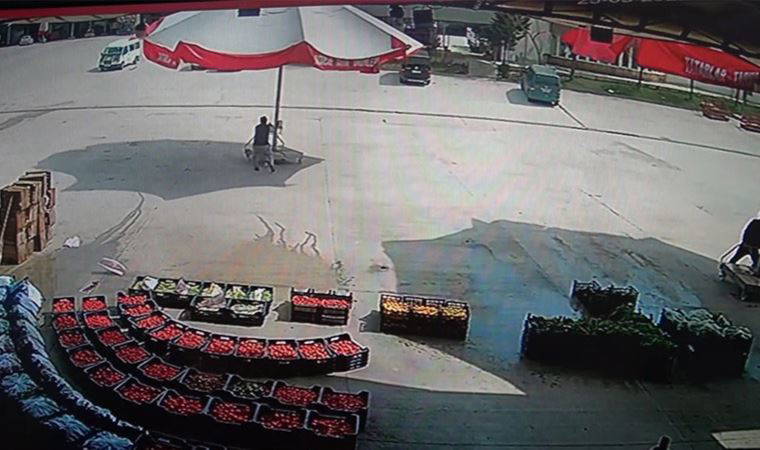 Amasya'da hal çalışanı şiddetli rüzgarda havalanan şemsiye ile bir süre sürüklendi