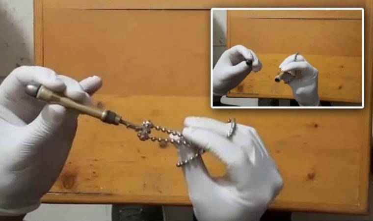 Boynundaki kolye 'suikast silahı' çıktı!