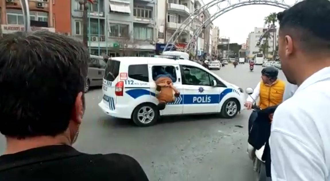 Gözaltına alınan zanlı polis aracının camından atlayarak kaçmaya çalıştı