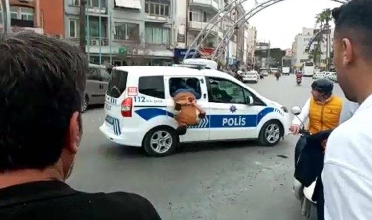 Gözaltına alınan zanlı polis aracının camından atlayarak kaçmaya çalıştı