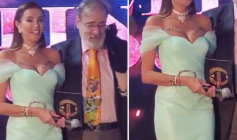 Özge Ulusoy'un göğsüne, Melis Sezen'i hedef alan eski MHP'li Ahmet Çakar'ın adı yazıldı