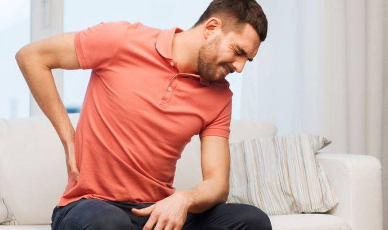 Bel fıtığı nedir? Ağır yük kaldırmak bel fıtığına neden olur mu? Bel fıtığında ameliyat son çare mi?
