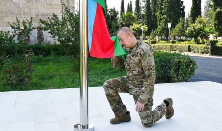 Aliyev raises Azerbaijan's flag in former breakaway region of Karabakh