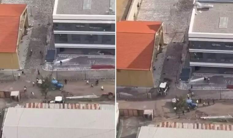 Operatör, tartıştığı işçileri iş makinesiyle kovaladı