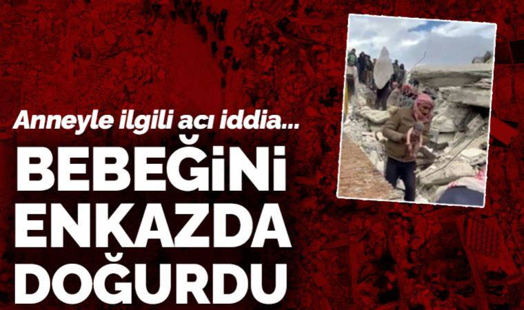 Suriye'de bir anne bebeğini çöken evinin enkazında doğurdu