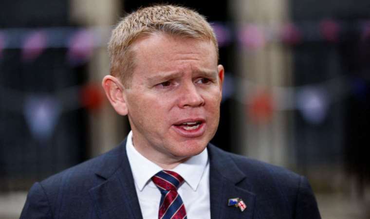 New Zealand’s justice minister resigns after being charged with resisting arrest