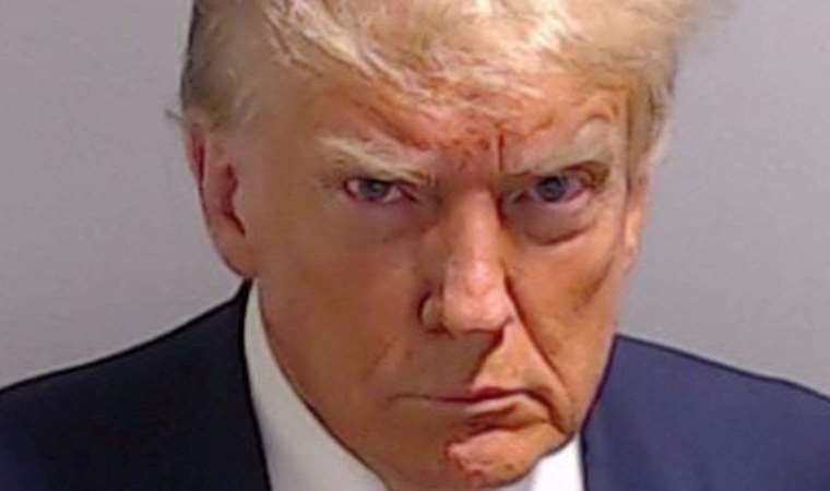 Trump surrenders at Fulton County jail in Georgia election subversion case