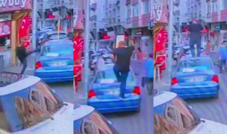 Hırsını alamadı... Kavga ettiği kişinin otomobiline yumruk ve tekmeyle saldırdı!
