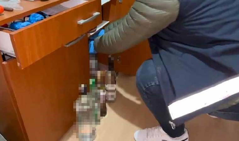 Tekel bayiinde sahte içki üretimi... Yüzlerce şişe ele geçirildi!