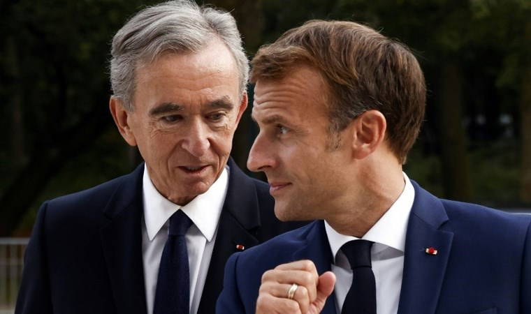 Macron'dan dünyanın en zengin iş insanına onur nişanı