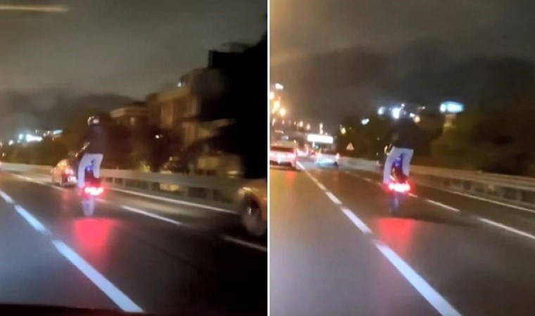 Motosikletlinin tek tekerlek üzerinde tehlikeli yolculuğu