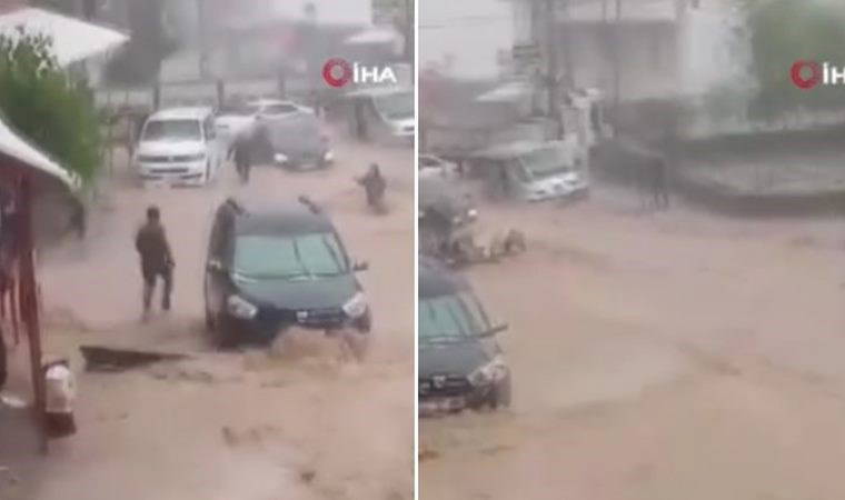 Korku dolu anlar kamerada: Suya kapılan kadın ve çocuğu kurtardılar!