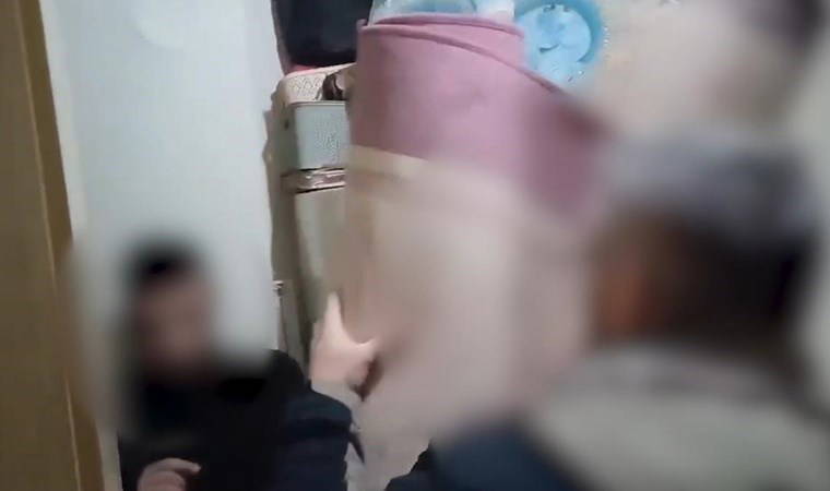 Aranan şahıs halıların arkasında çıktı