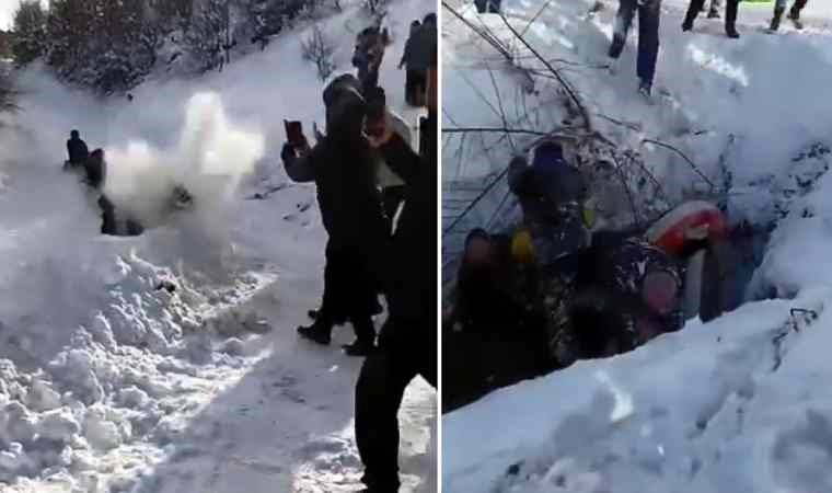 Anbean kaydedildi... Şambrelle kayarken çukura uçtular