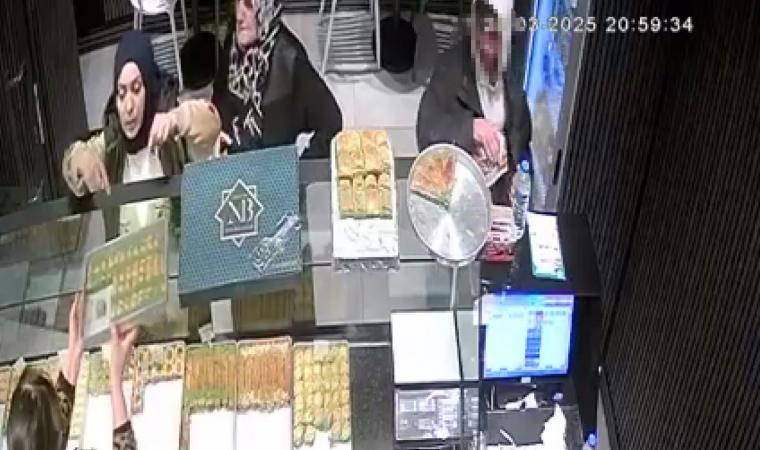 Sultangazi'de dükkandaki sadaka kutusunu çalan şüpheli kamerada