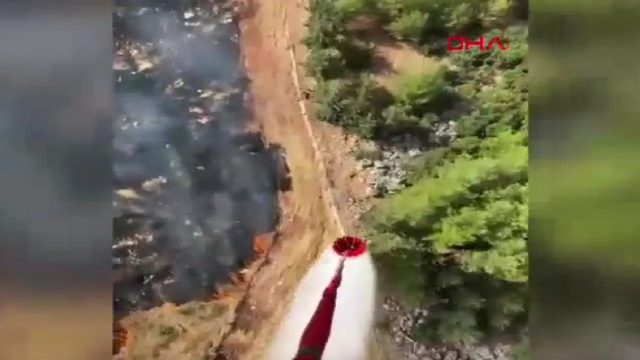 Antalya'da, dün yanan ormanın bitişiğinde arazide yangın