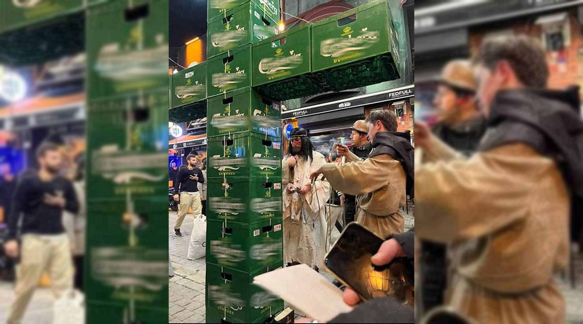 Bira kasalarıyla haç işareti yapan 3 genç gözaltına alındı