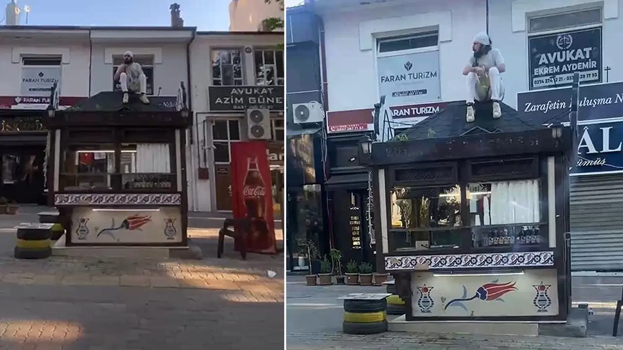 Yer: Kütahya... Büfesinin üzerine çıkıp kendini zincirledi!