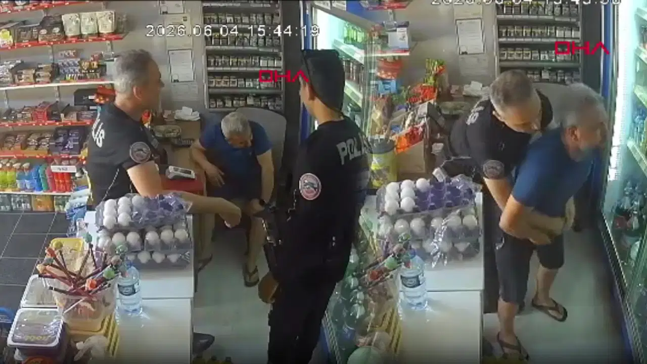 Nefes borusuna şeker kaçan bakkalı, polis Heimlich manevrası