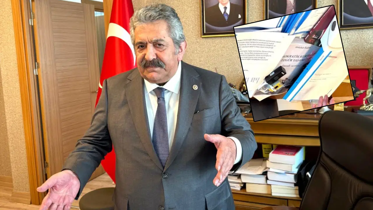 MHP'li Feti Yıldız'ın fotoğrafında dikkat çeken ayrıntı: Teröristbaşının yasaklı kitabı masasında