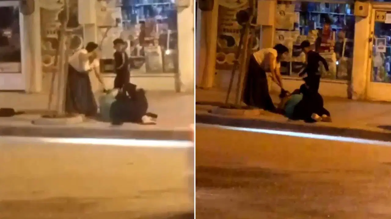 Karabük'te caddede iki kadının sopalı kavgası kamerada